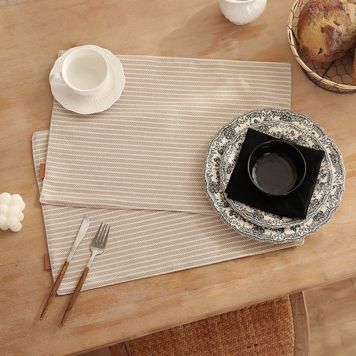 Rectangular table set made of woven herringbone cotton blend with anti-slip coating Kalsten