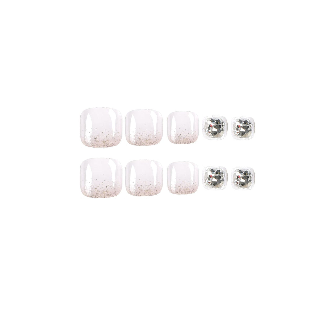 Artful toenail design with sparkling embellishments Kalsten