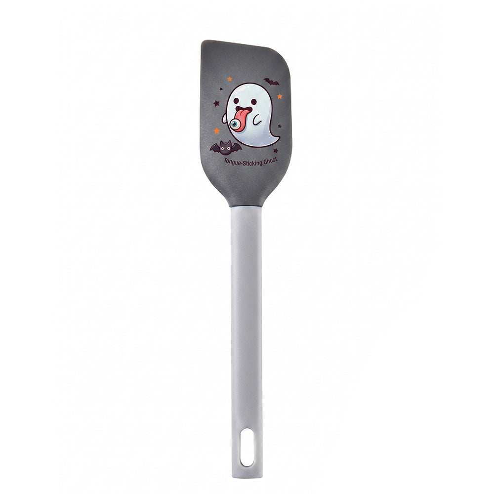 Silicone kitchen spatula with flexible scraper and child-friendly witch motif