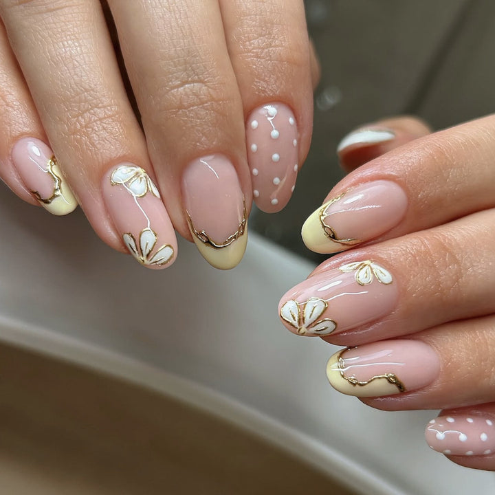 Artful Nail Extensions with Floral Design and Elegant Gold Accents Kalsten