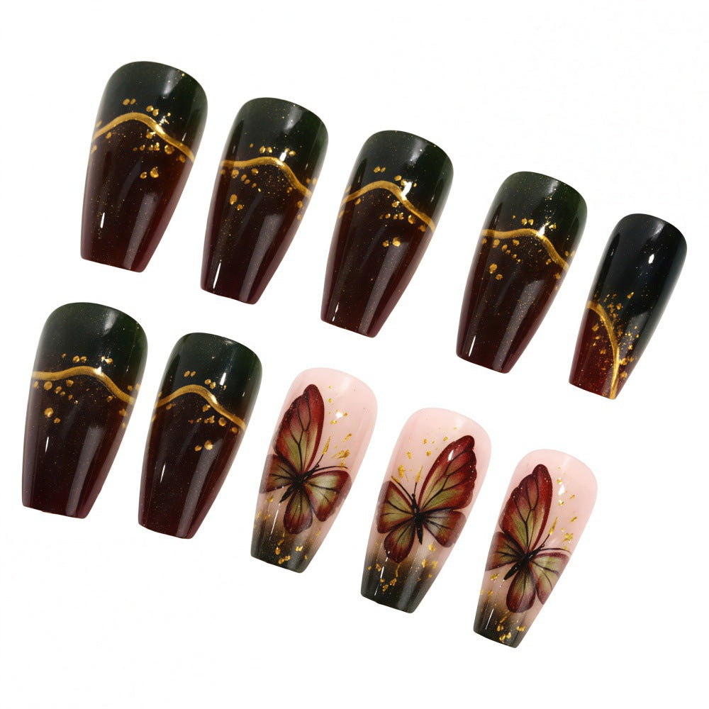 Artificial nails with elaborate butterfly and flower designs Kalsten