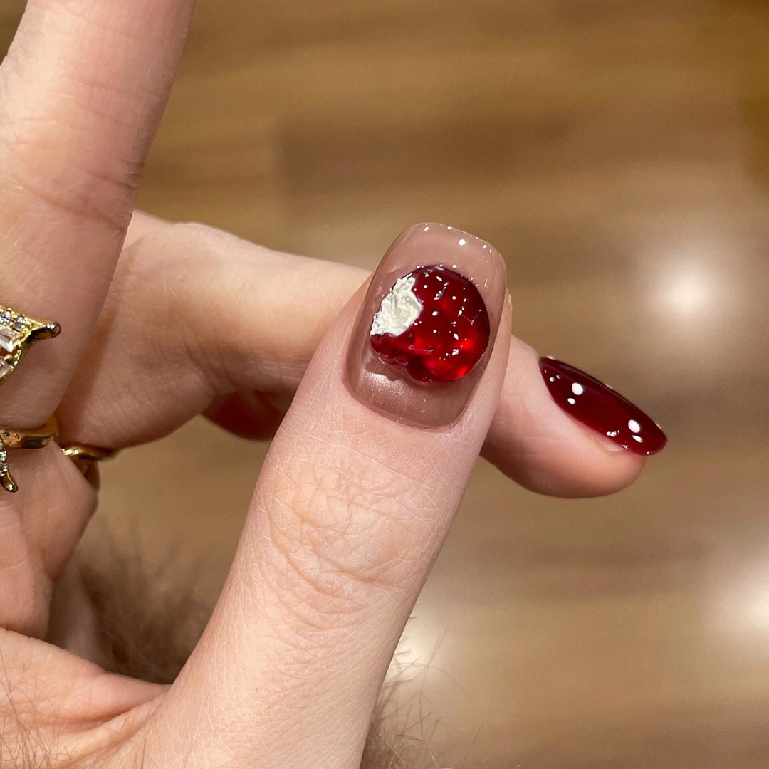 Artificial nails with festive gift design Kalsten