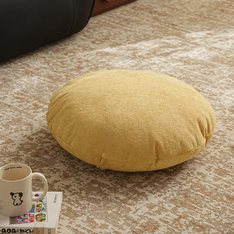 Round floor seat pouf made of teddy plush with a shape-retaining padded core Kalsten