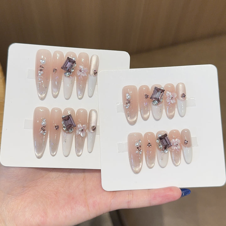 Artificial nails with elegant jewelry details Kalsten