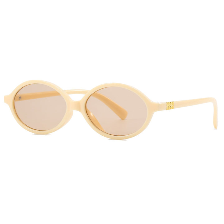 Women's fashionable sunglasses with oval frame and golden accents Kalsten
