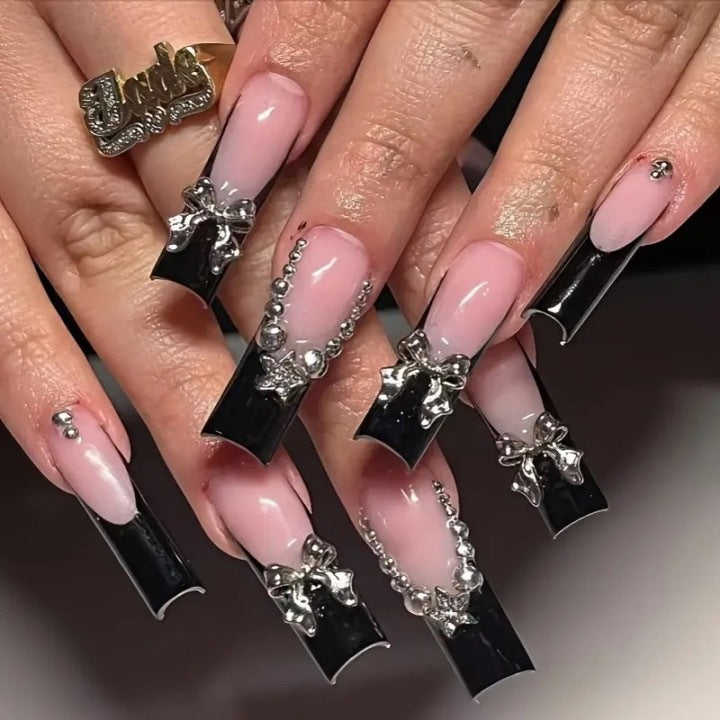 Artificial nail set with glamorous rhinestone accents and elegant 3D designs Kalsten