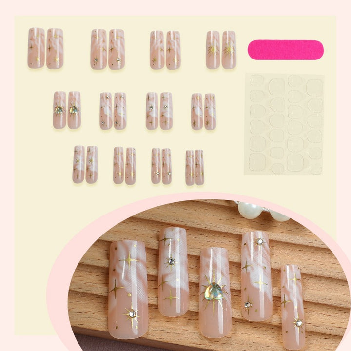 Nail set with glamorous gold decorations Kalsten