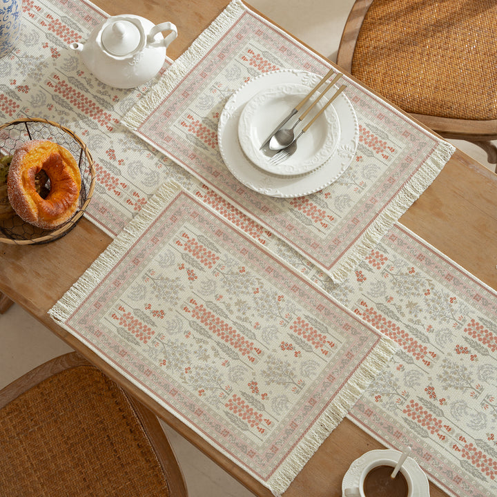 Vintage-inspired woven table runner with floral border and fringes Kalsten