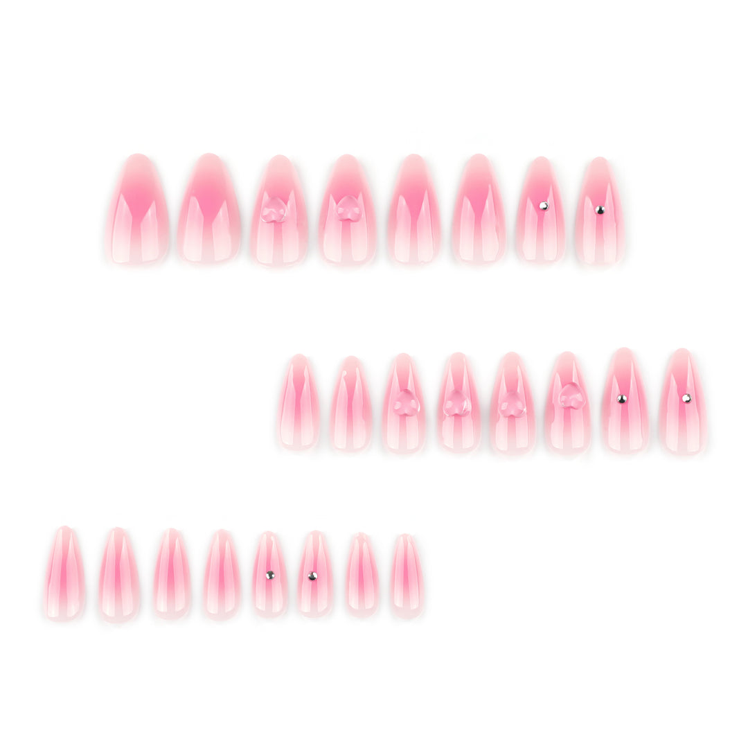 Artful stiletto nails with heart design and glitter accents Kalsten