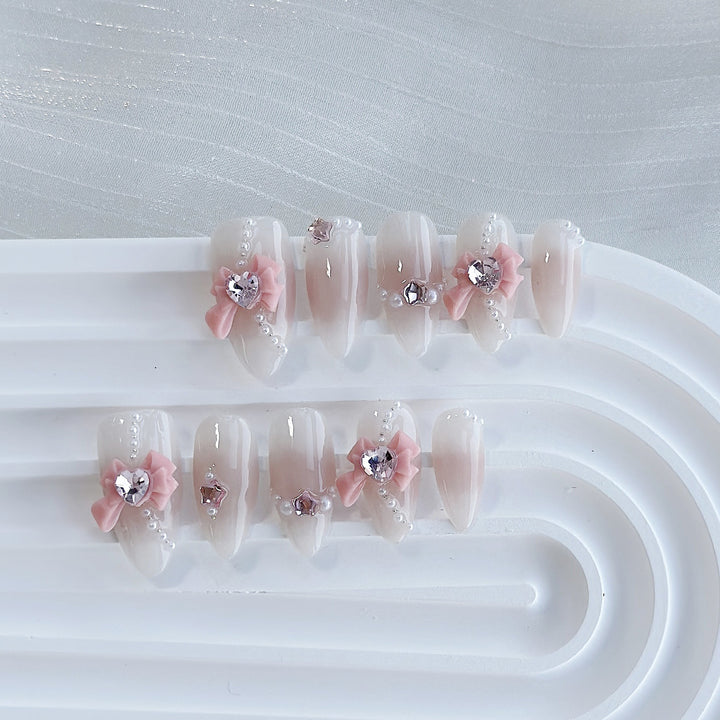 Artistic Press-On Nail Art Set with Heart and Celestial Designs