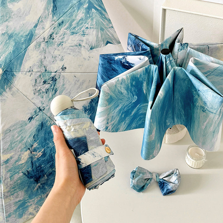 Ladies elegant folding umbrella with unique marble pattern Kalsten
