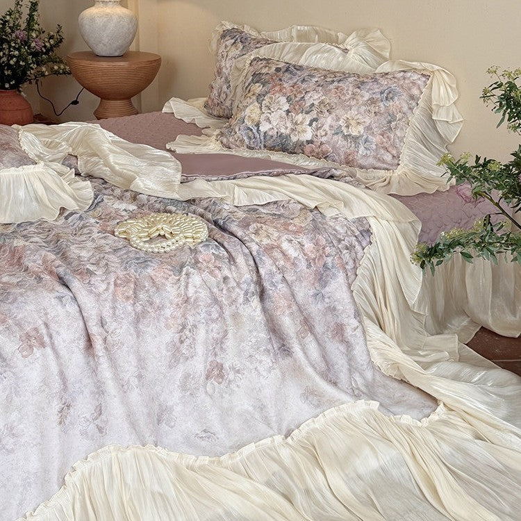 Bedding set with pleated flounces and floral watercolor print