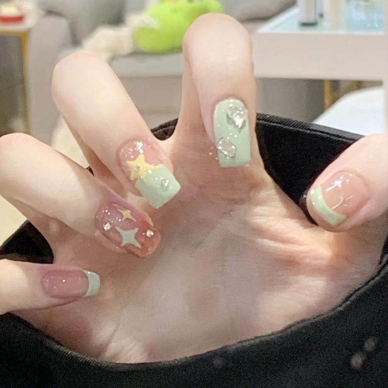 Artistic Press-On Nail Set with Glittery Star Accents Kalsten