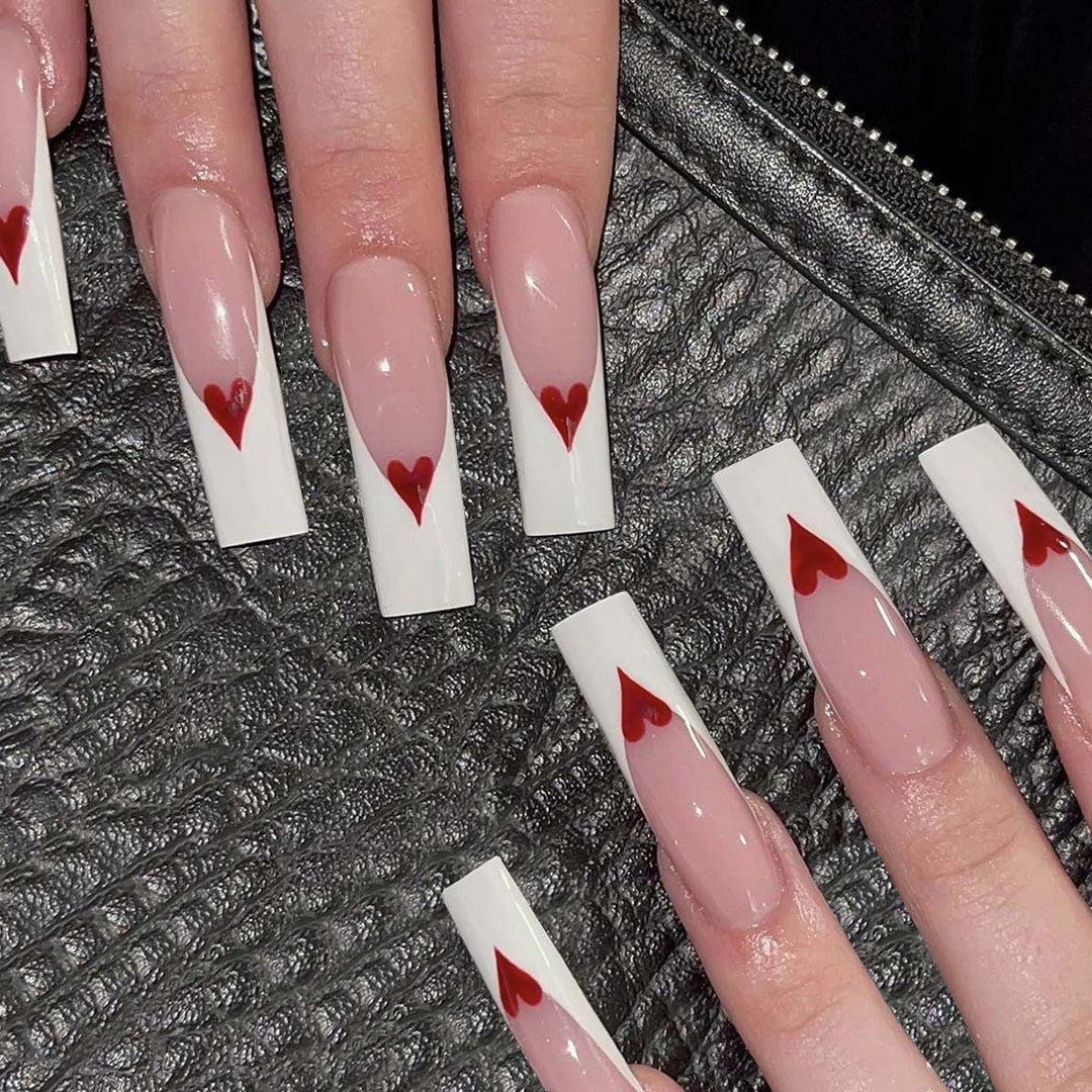 Artful nail extensions with heart design Kalsten
