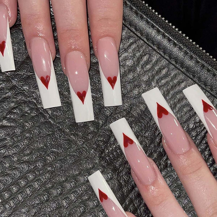 Artful nail extensions with heart design Kalsten