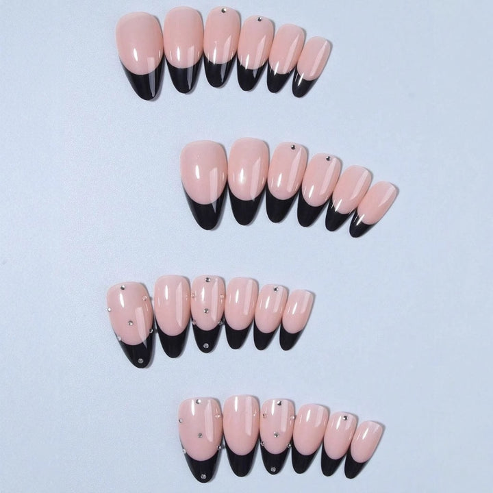 Artificial nail tips with elegant French design and glamorous details Kalsten