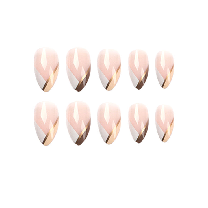Artful nail art in elegant stiletto design with golden accents Kalsten