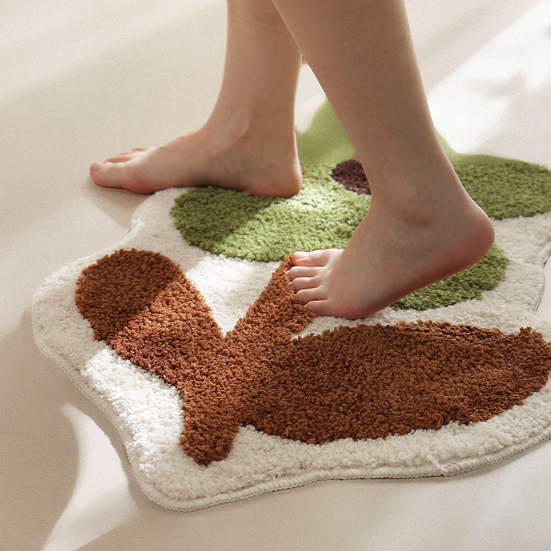 Flower-shaped hand-tufted bath mat with voluminous pile and non-slip latex backing Kalsten