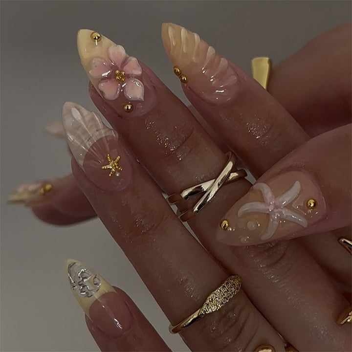 Artificial nail set with maritime motifs and colorful accents Kalsten
