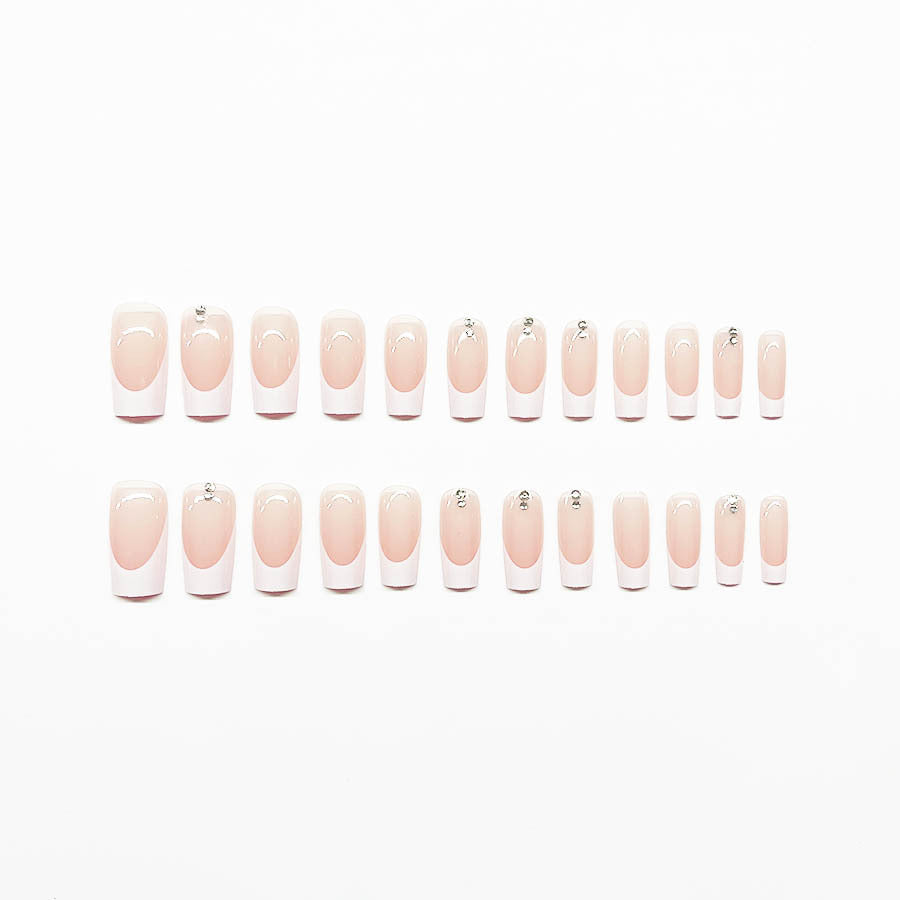 Elegant artificial nail set with high-gloss finish and rhinestone decorations Kalsten