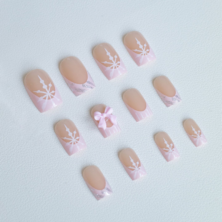 Artistic Press-On Nail Set with Floral and Snowflake Designs