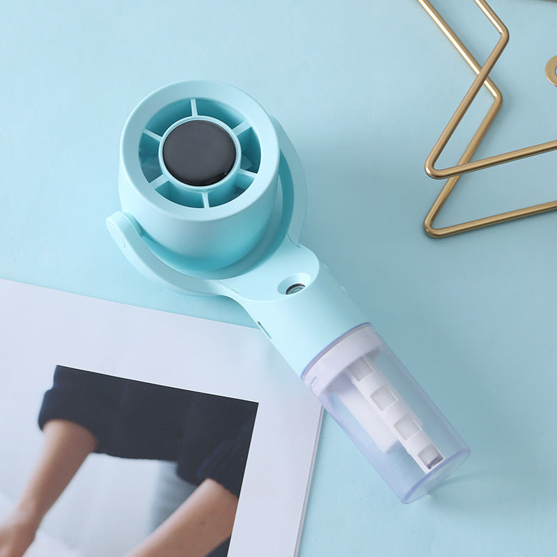 Cooling handheld misting fan with swivel air head detachable water reservoir and USB rechargeable battery Kalsten