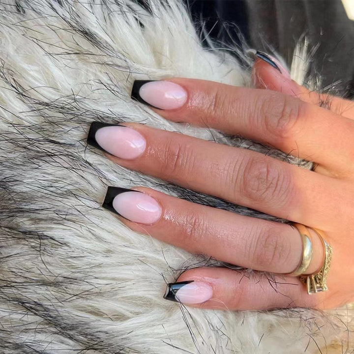 Elegant stiletto nails with contrasting French tip Kalsten