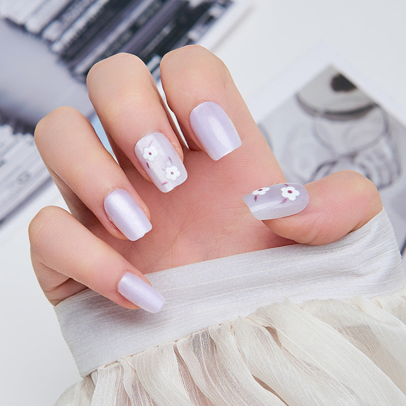 Artistic nail extensions with floral accents Kalsten