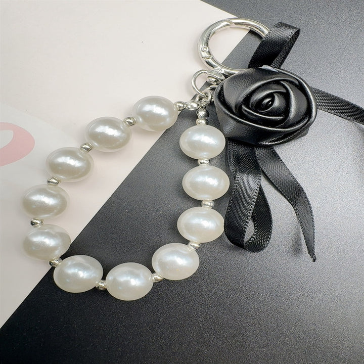 Elegant Pearl and Leather Charm Keychain Kalsten