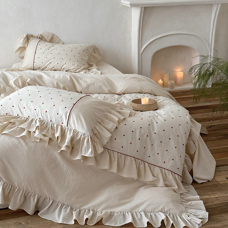 Duvet cover set with ruffle, embroidered dots, and stonewashed cotton finish
