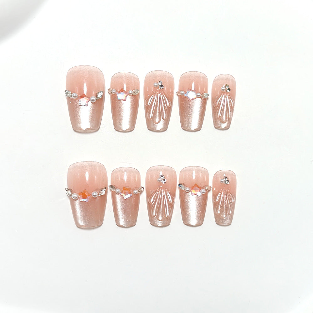 Exquisite artificial nails with glitter and pearl accents Kalsten