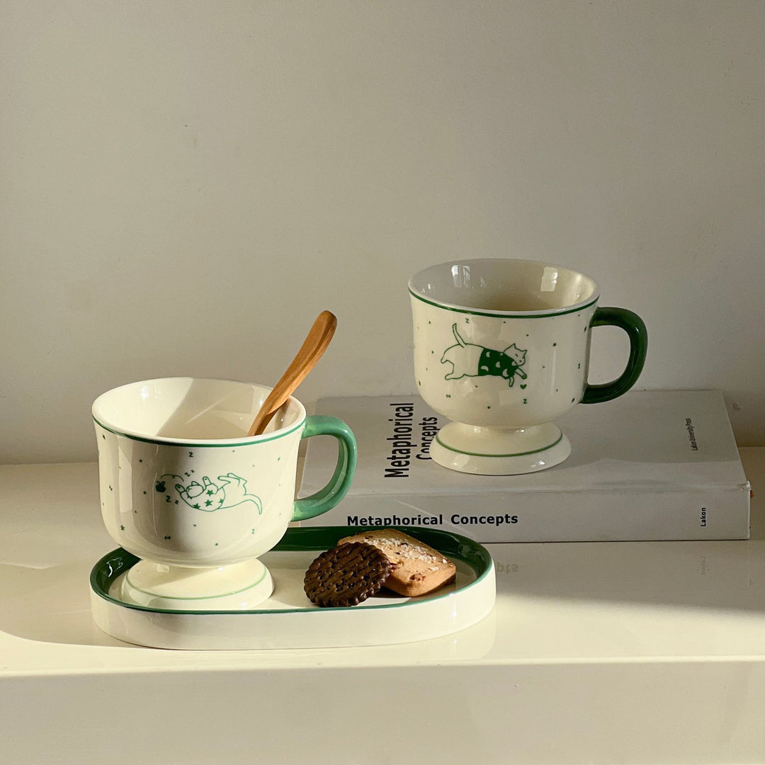 Handcrafted ceramic plate with illustrative cat design