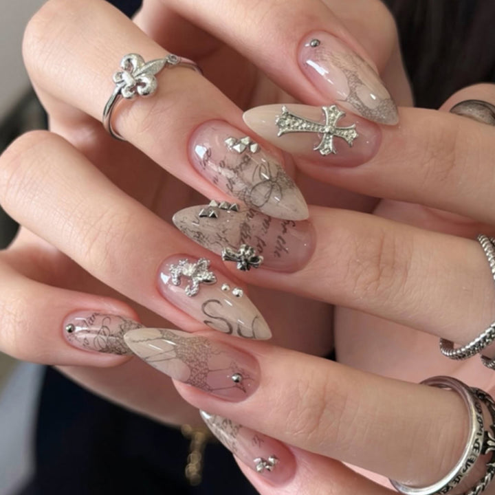 Glamorous stiletto nails with elegant star design Kalsten