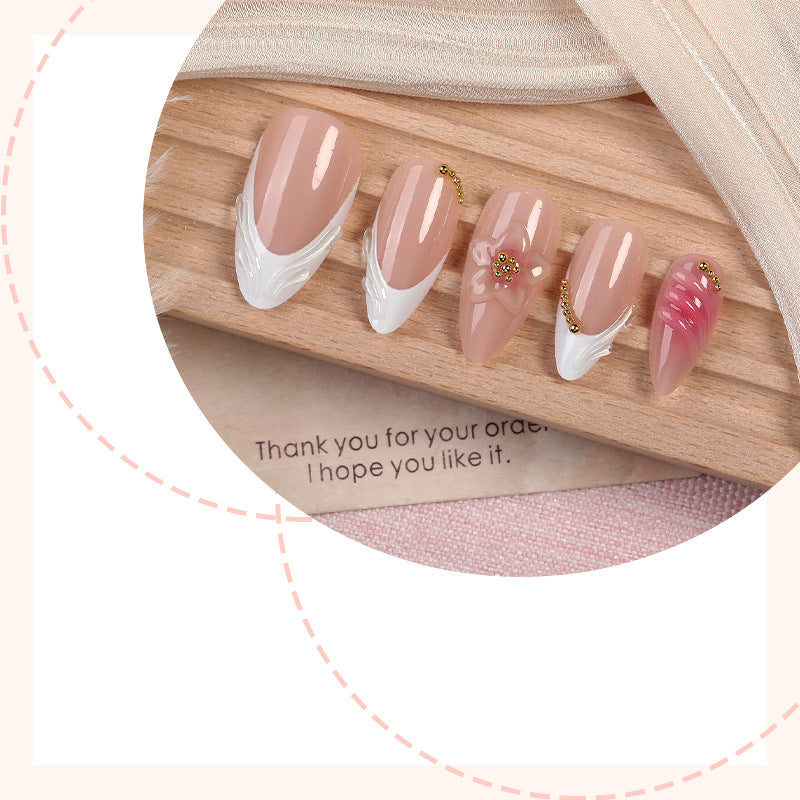 Acrylic nail set with floral design and elegant embellishments Kalsten