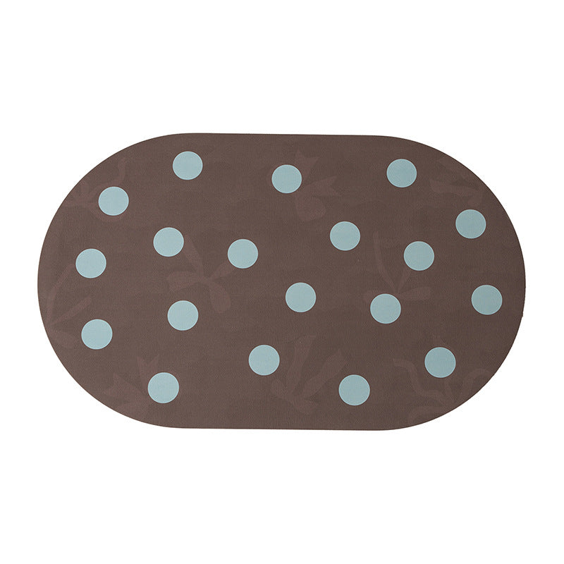 Wipeable placemat made of PVC with large polka dot pattern and non-slip backing Kalsten