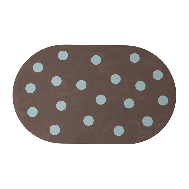 Wipeable placemat made of PVC with large polka dot pattern and non-slip backing Kalsten