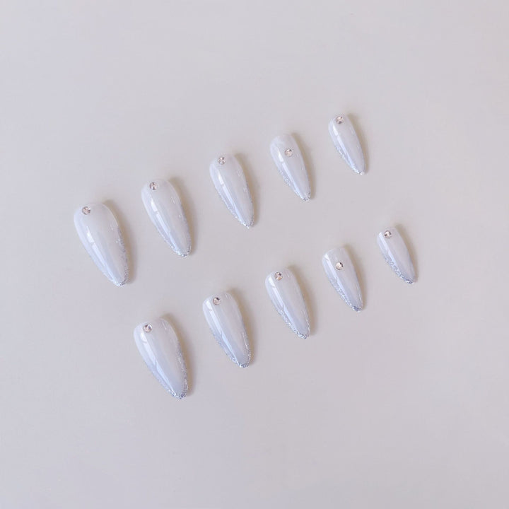 Acrylic nail set with elegant tips and sparkling accents Kalsten