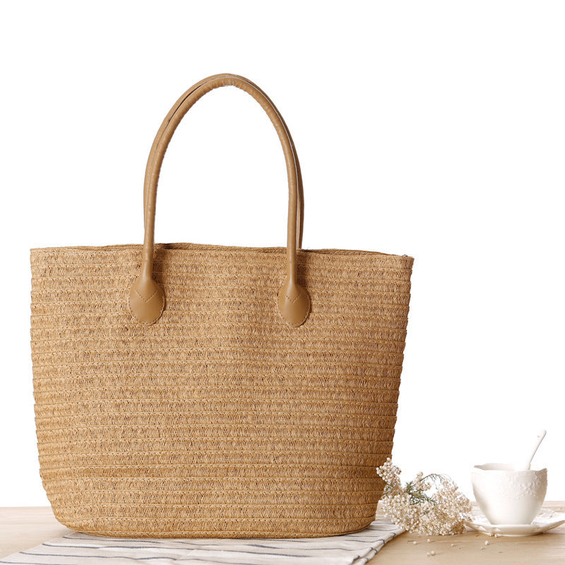 Spacious straw shopper with leather carrying handles Kalsten