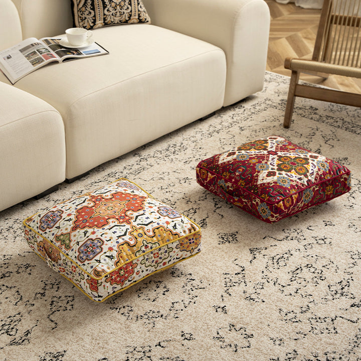 Square decorative cushion with oriental medallion print, piping and carrying handle