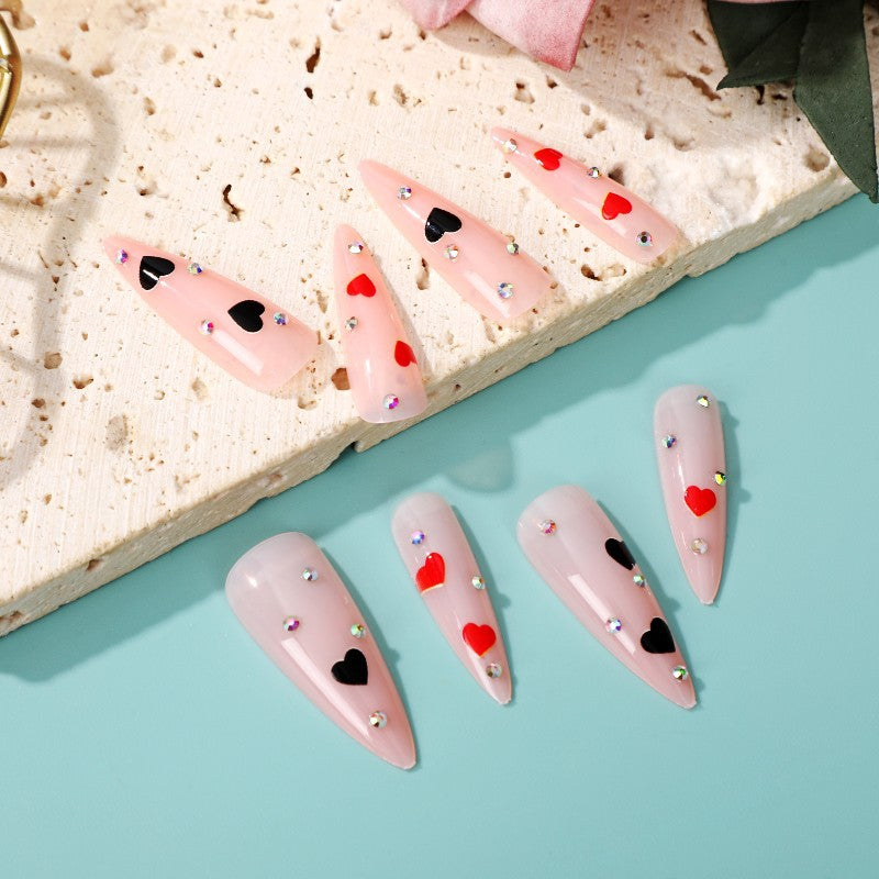 Glamorous artificial nails with heart accents Kalsten