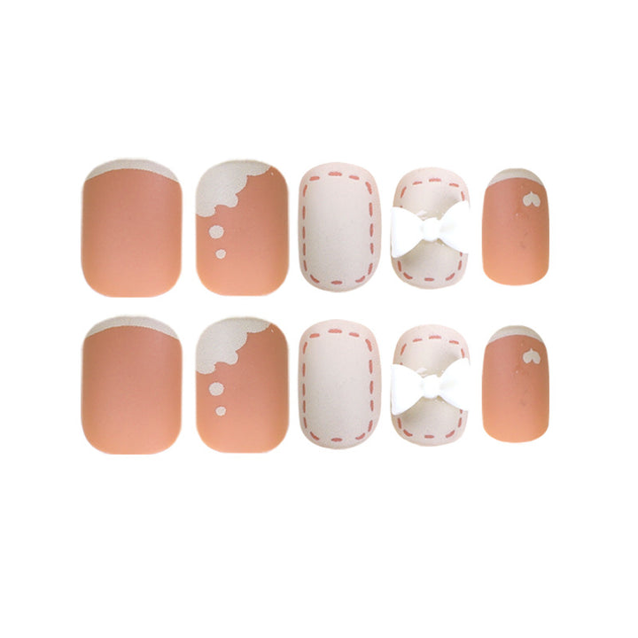 Artistic nail nails with decorative bow designs and French tips Kalsten