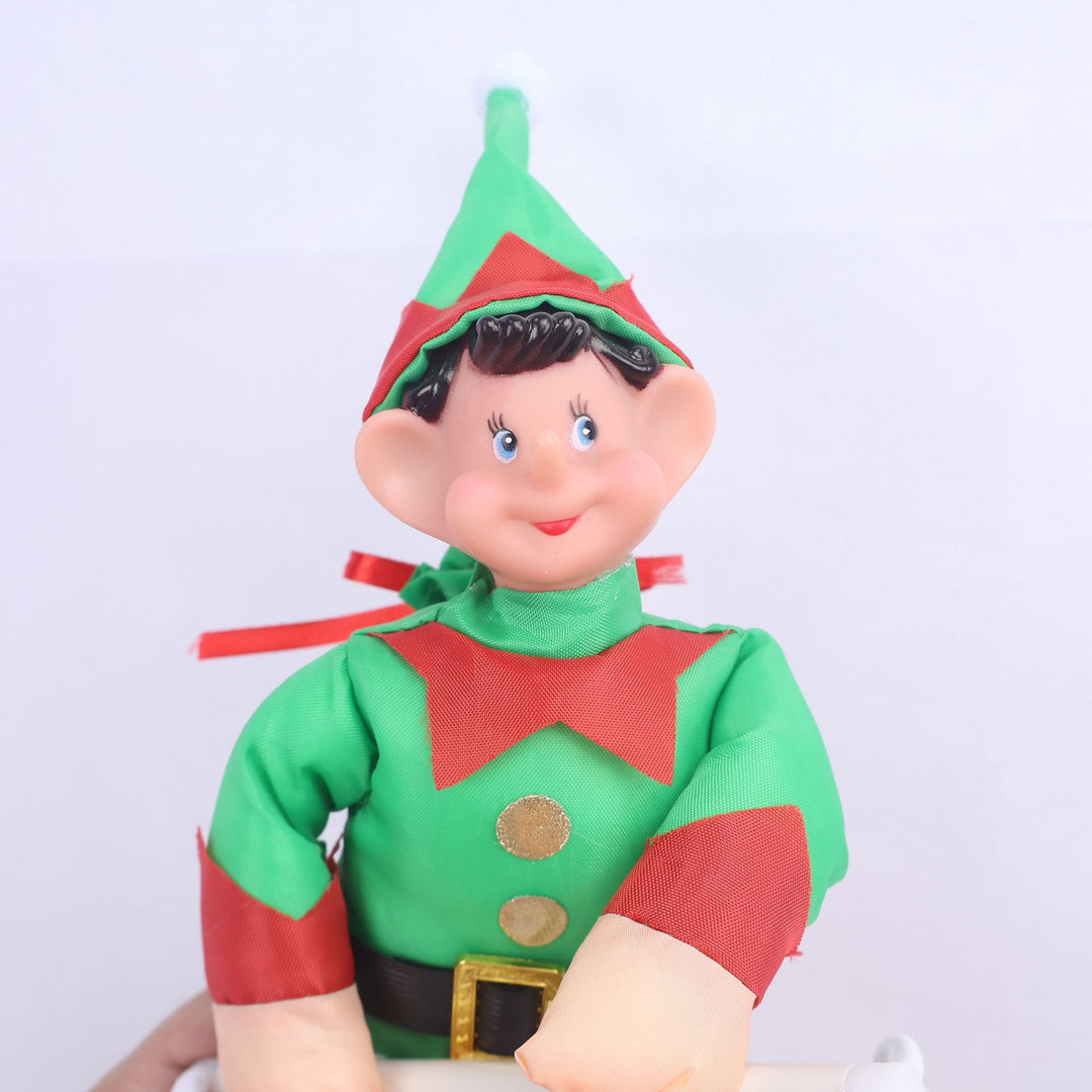 Inflatable Santa Claus figures climbing ladder