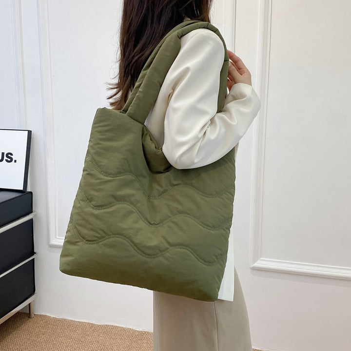 Padded shoulder bag with wave design Kalsten