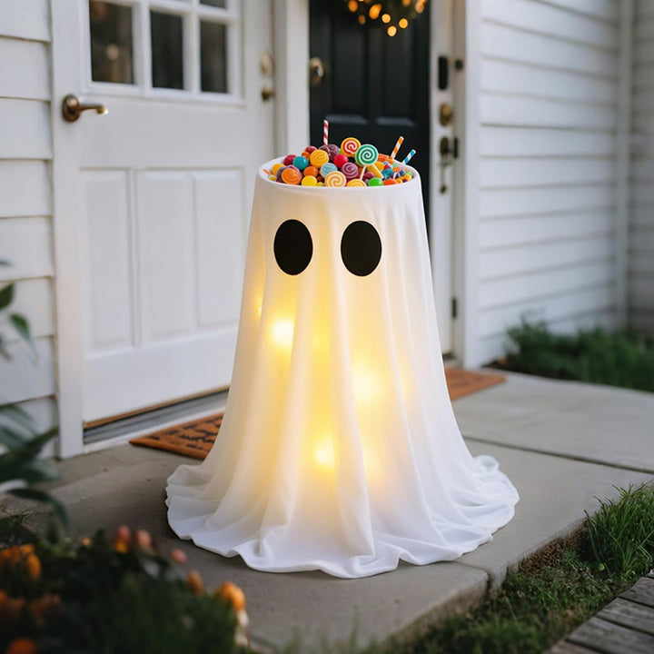 Glowing Halloween candy bowl with ghost wrap and LED interior lighting