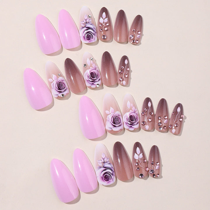 Creative nail art set with elegant rose accents and soft color gradient Kalsten