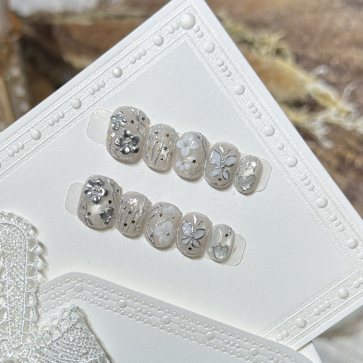 Decorative Press-On Nail Art Set with Floral and Star Accents Kalsten