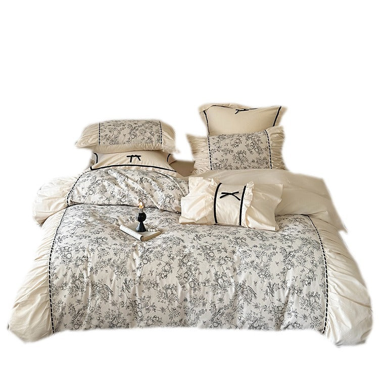 Romantic cotton percale bedding set with fine toile print and ruffle trim