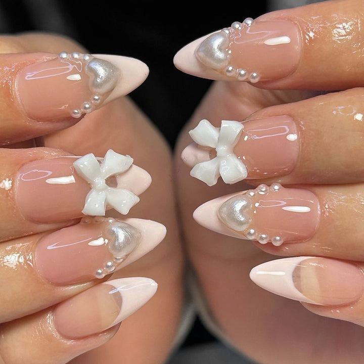 Artificial nail set with elegant pearl and bow decorations Kalsten
