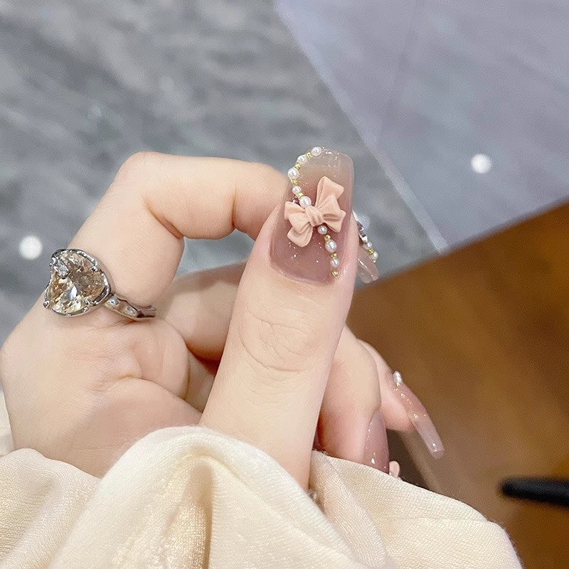 Glamorous artificial nails with moon and star motif Kalsten
