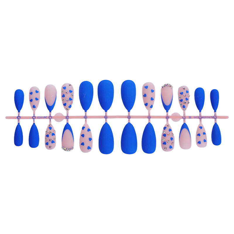 Nail art set with heart design and glitter accents Kalsten